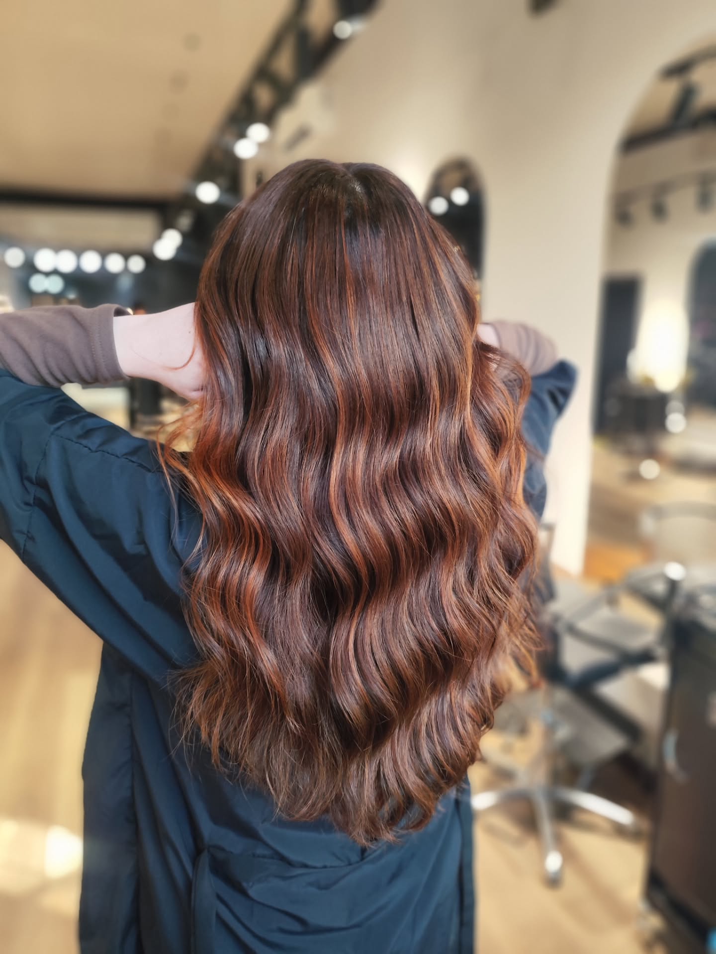 september hair color trends 2026 Warm Chestnut Brunette With Cinnamon Dimension