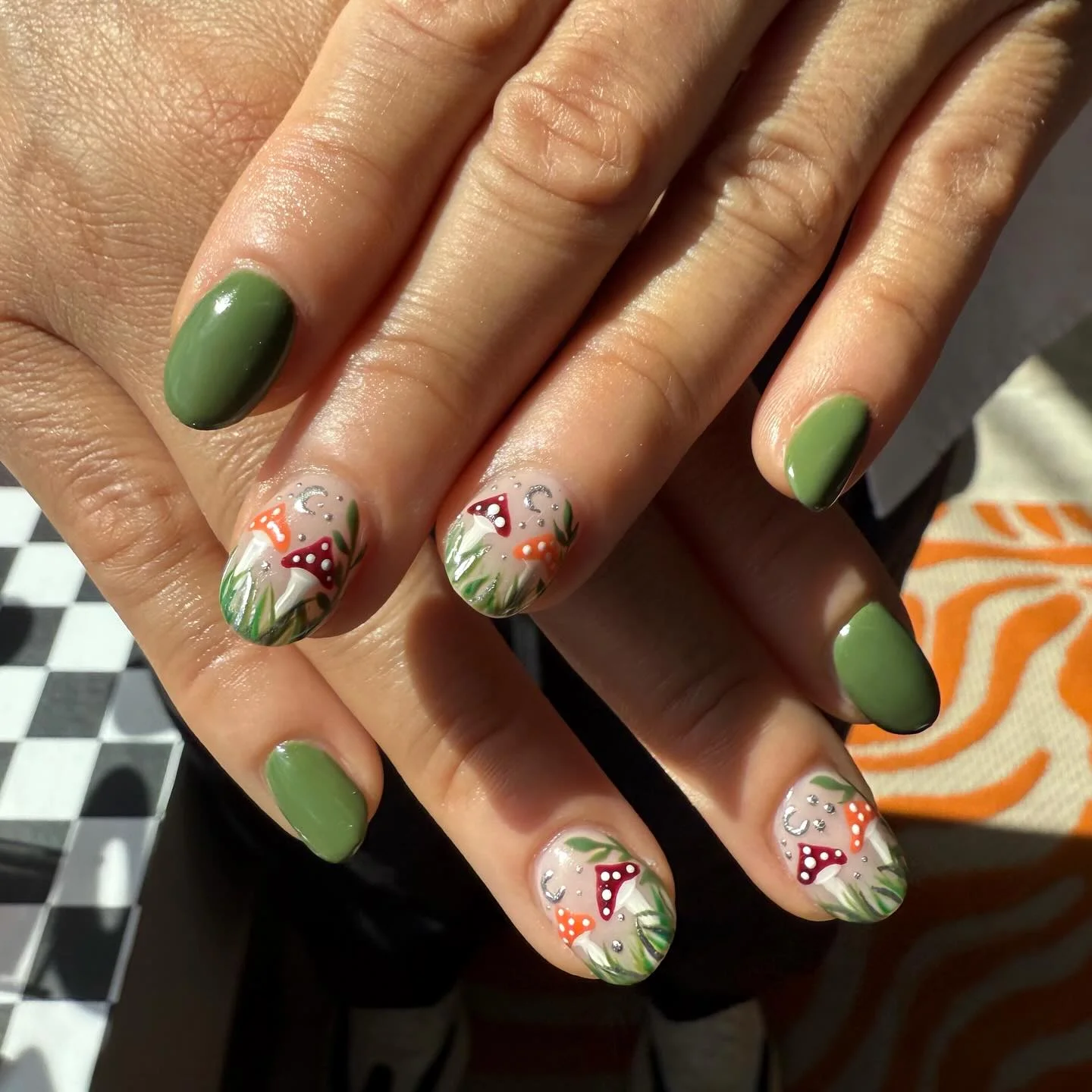 fall nail art ideas 2026 Olive Green Nails With Tiny Mushroom And Woodland Details