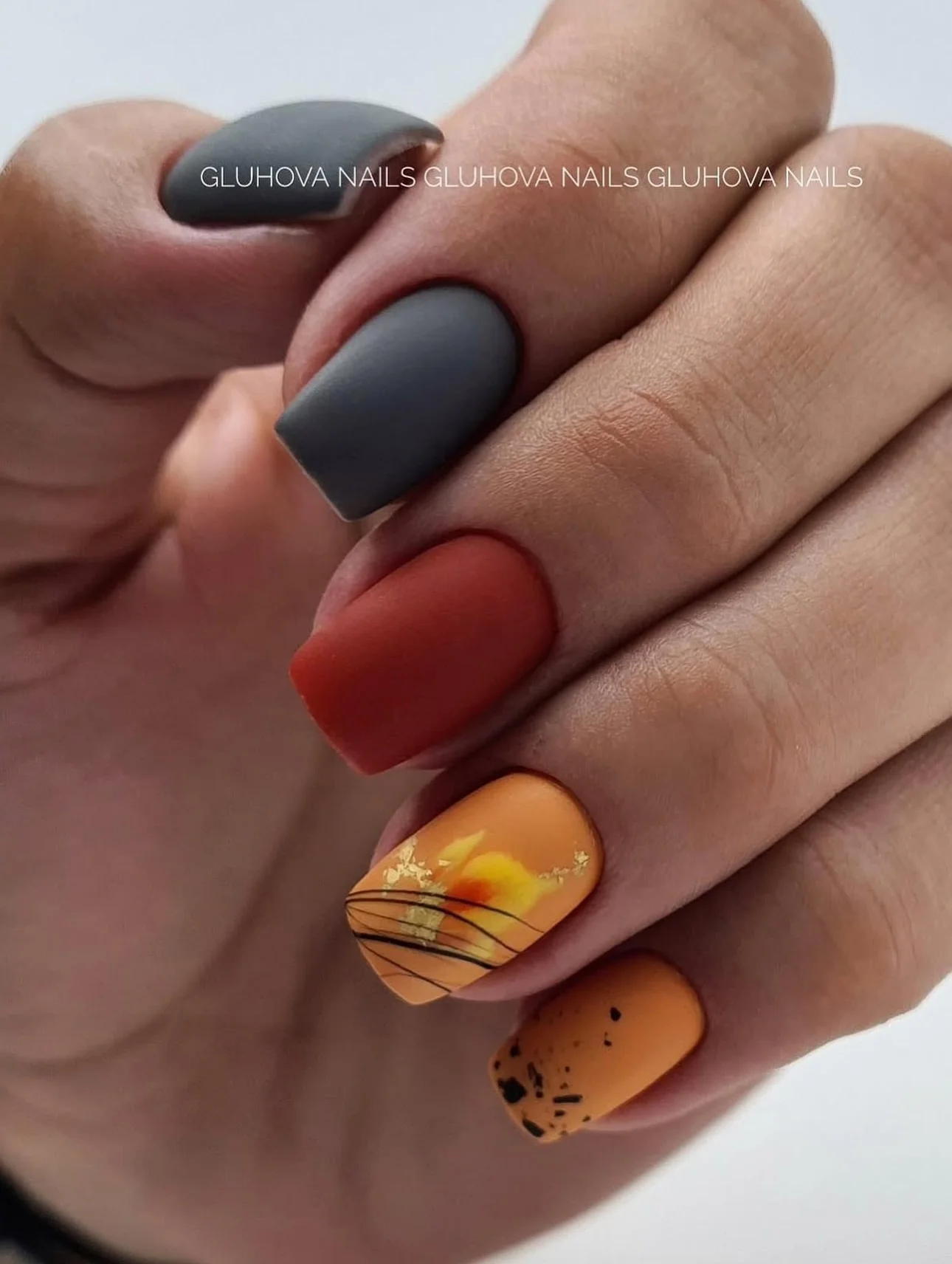 fall square nails 2026 Burnt Orange And Charcoal With Autumn Leaf Art
