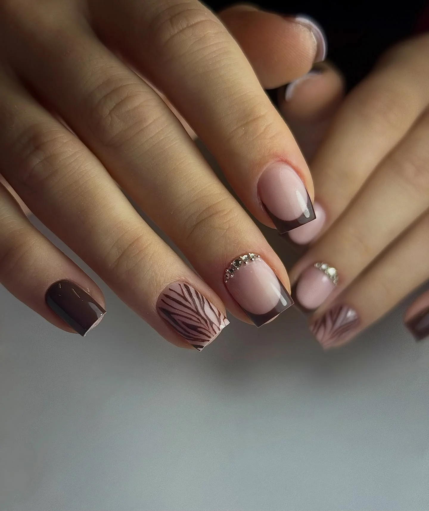 fall trendy nails 2026 Chocolate French Tips With Delicate Rhinestone Accents