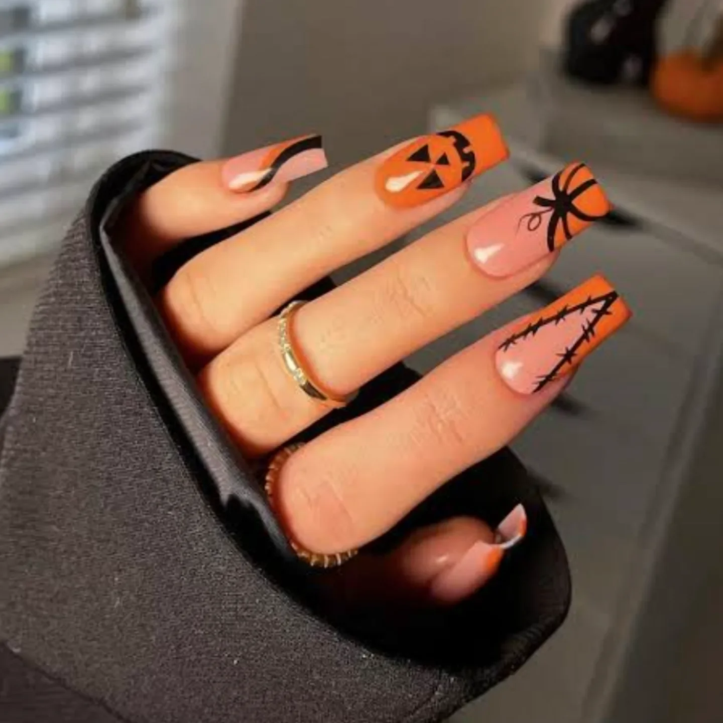 halloween nails designs 2026 Long Coffin Nails With Bold Pumpkin And Spider Motifs