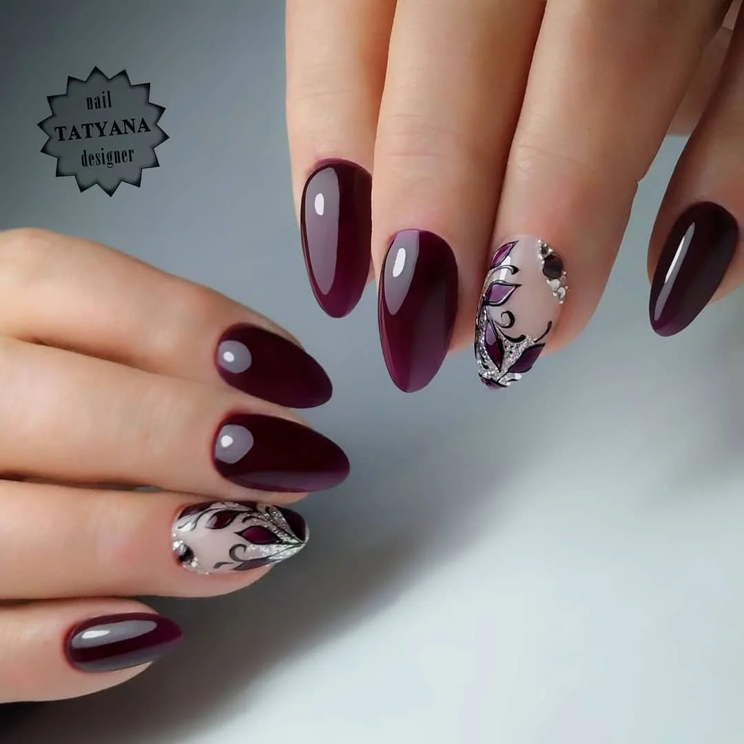 maroon fall nails 2026 Ornate Burgundy Nails With Silver Botanical Accents