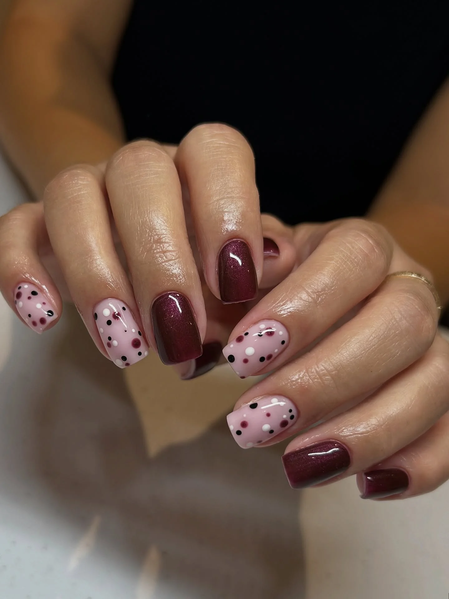 polka dot fall nails 2026 Blush Pink And Burgundy Mixed Dot Manicure