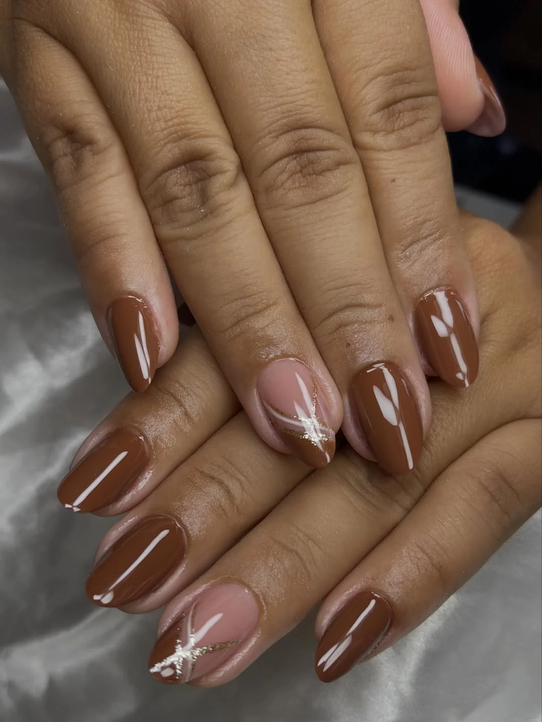 fall accent nail designs 2026 Chocolate Brown Nails With Delicate Gold Leaf Accents