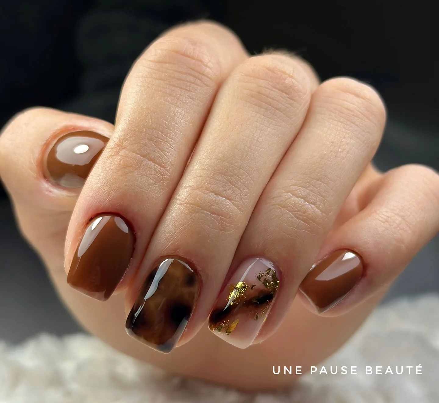 fall nails for fair skin tones 2026 Glossy Chocolate Brown With Golden Foil Accents