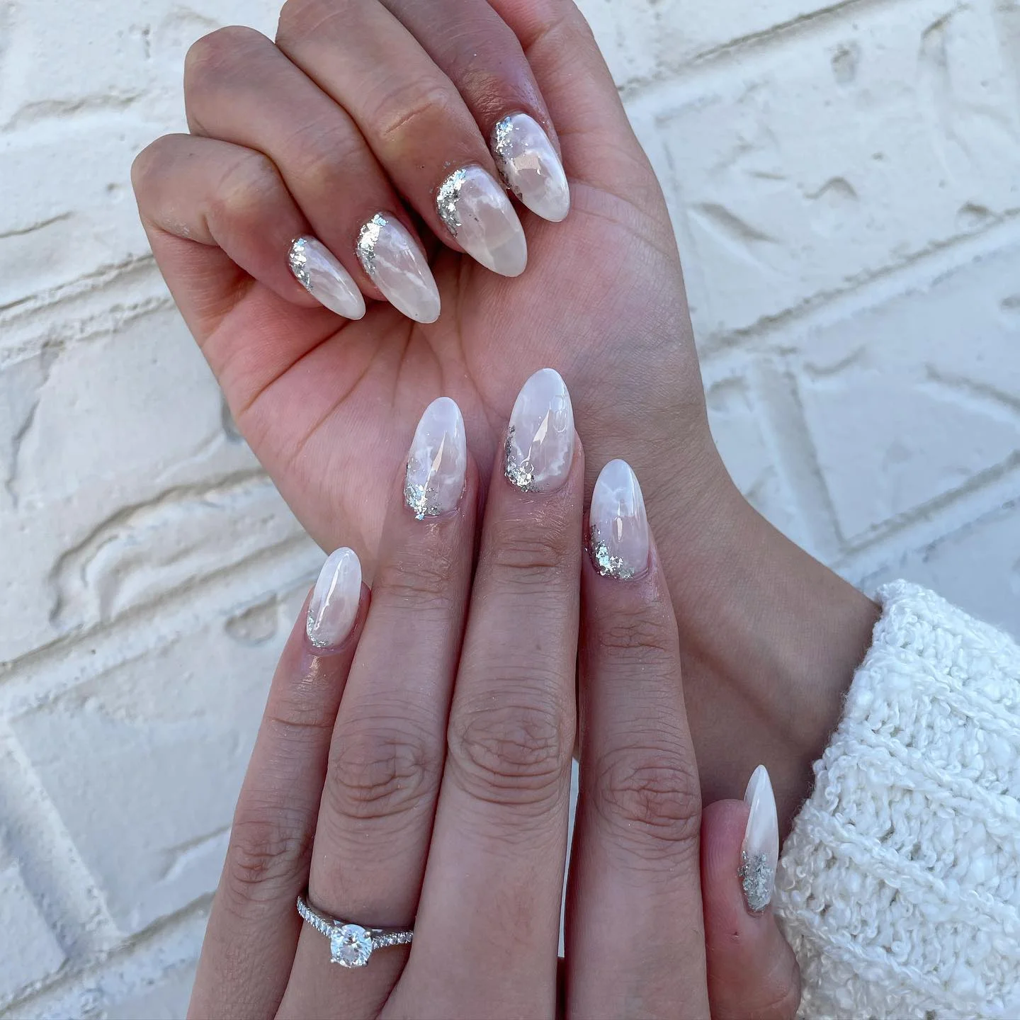 fall wedding nails 2026 Pearl Marble Almond Nails With Silver Sparkle