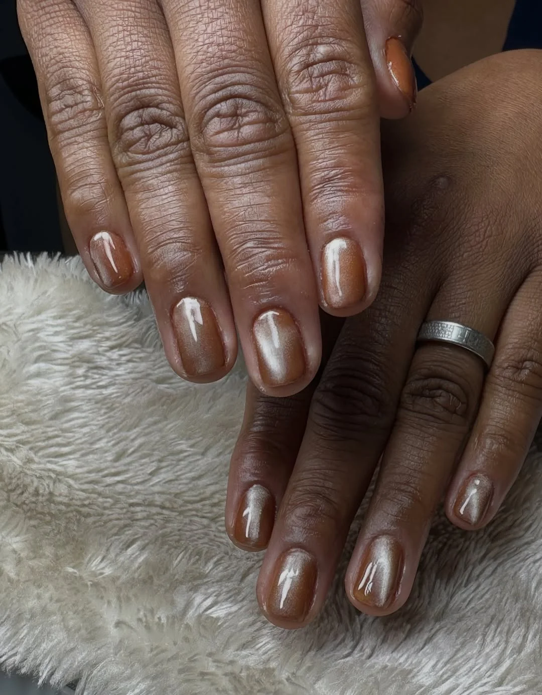 fall nails for dark skin 2026 Short Bronze Chrome Nails With Soft Metallic Glow
