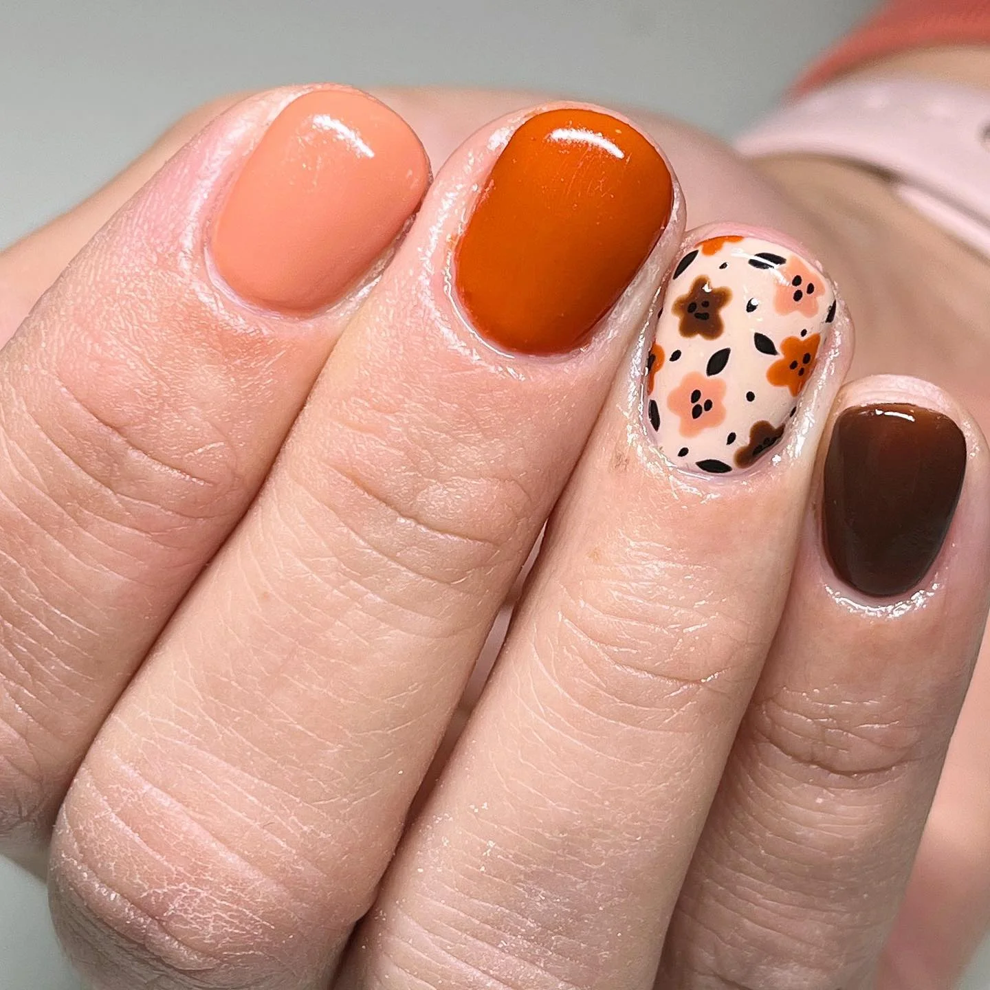 fall nails with accent nail Milky Nude Nails With Chocolate Tips And Autumn Leaf Art