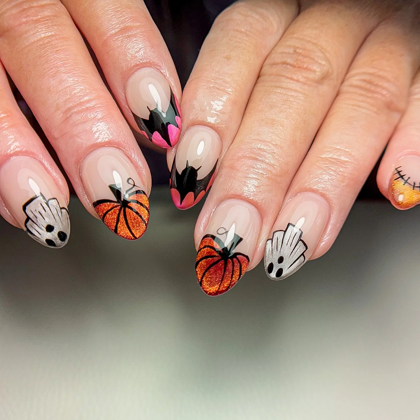 halloween nail art 2026 Glitter Pumpkins And Bat Wing Tips
