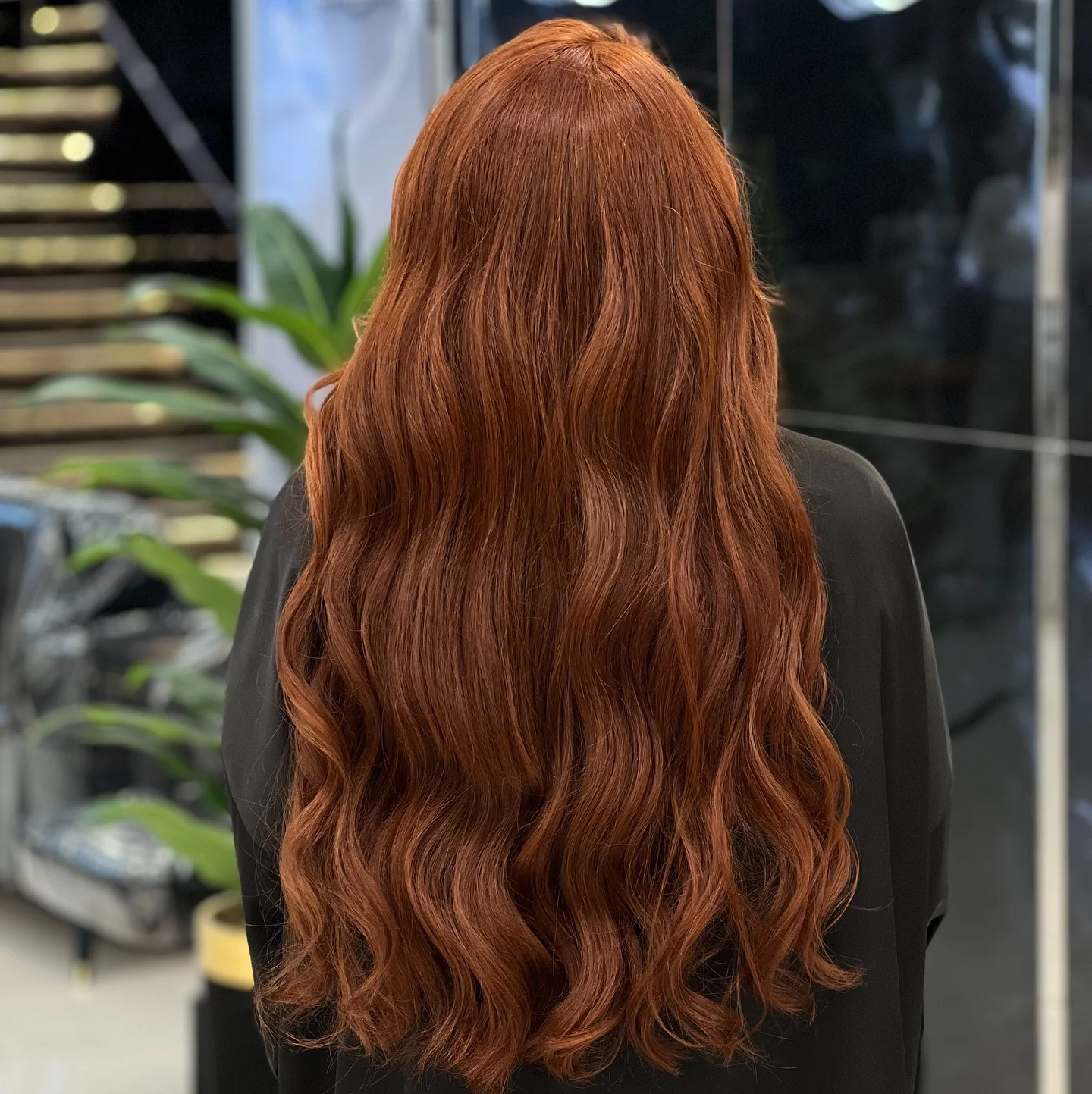 september hair color trends 2026 Rich Copper With Long Glossy Waves