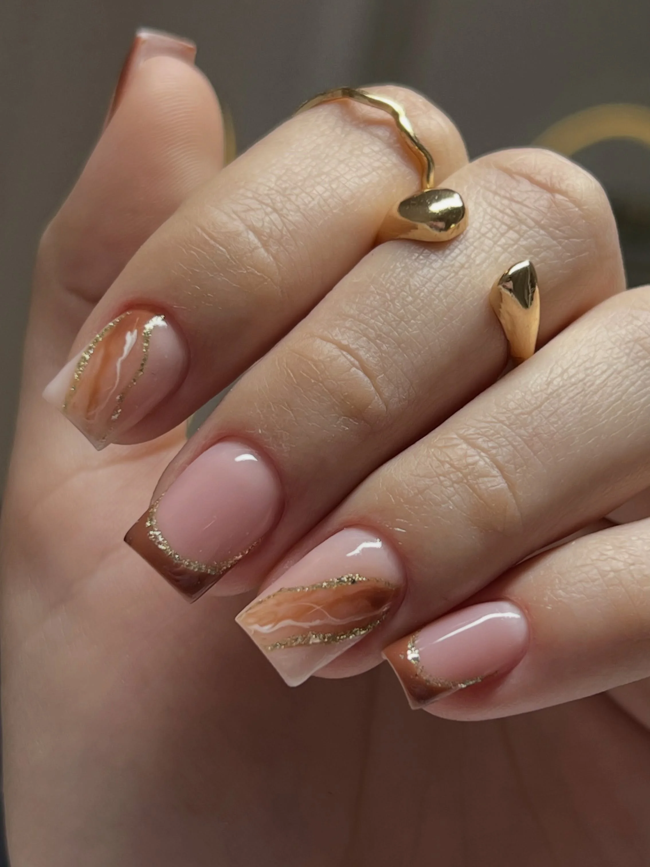 brown fall nails 2026 Warm Caramel Marble With Golden Details
