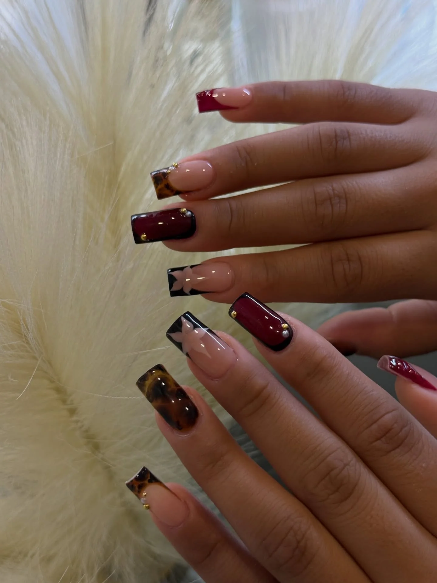 fall nails for medium skin tone Burgundy And Tortoiseshell French Tips With Gold Details