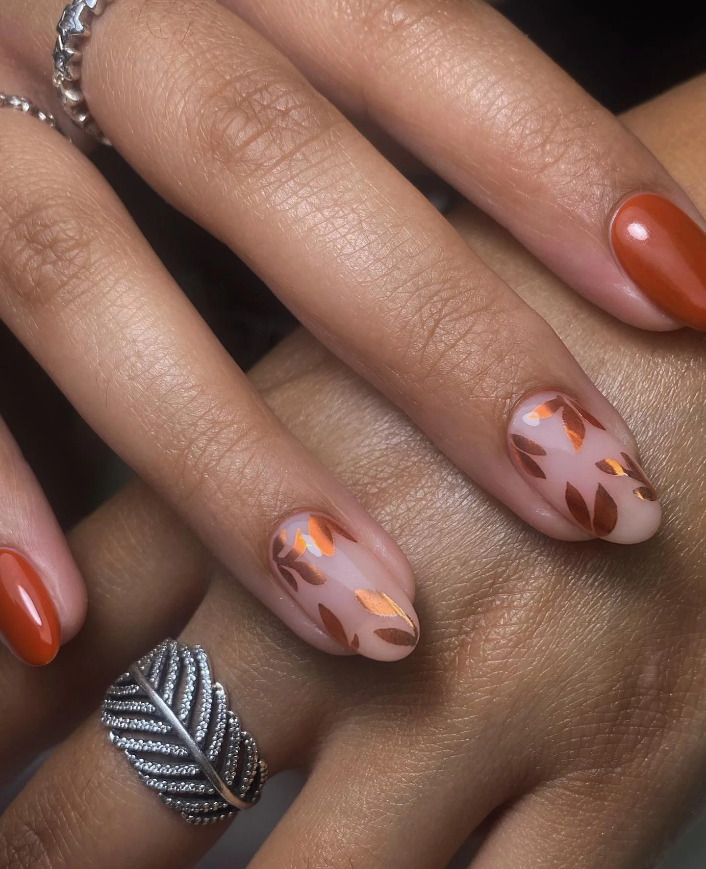 fall short almond nails 2026 Burnt Orange Foil Leaves For A Cozy Autumn Glow