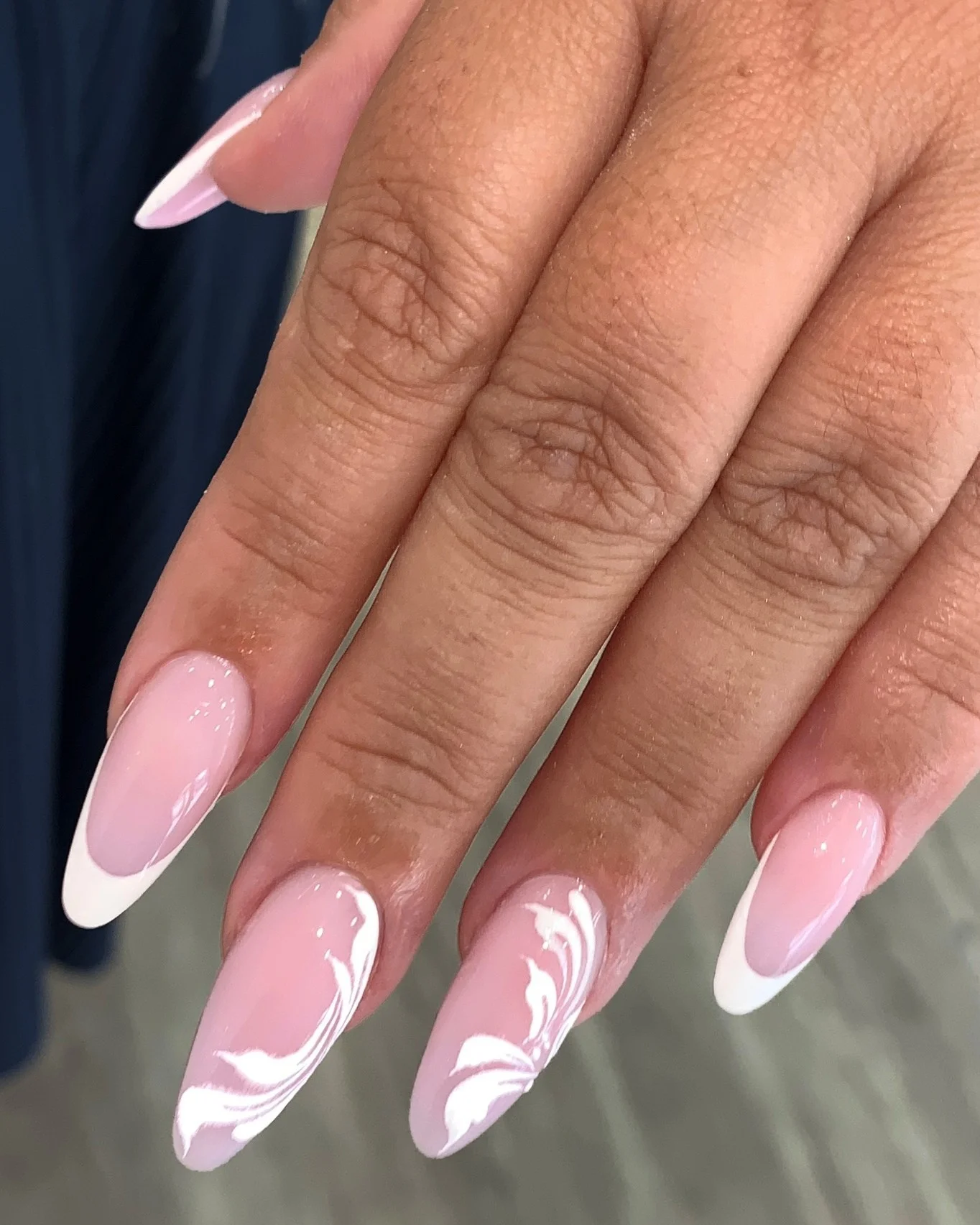 fall wedding nails 2026 Classic French Almond Nails With Flowing White Florals