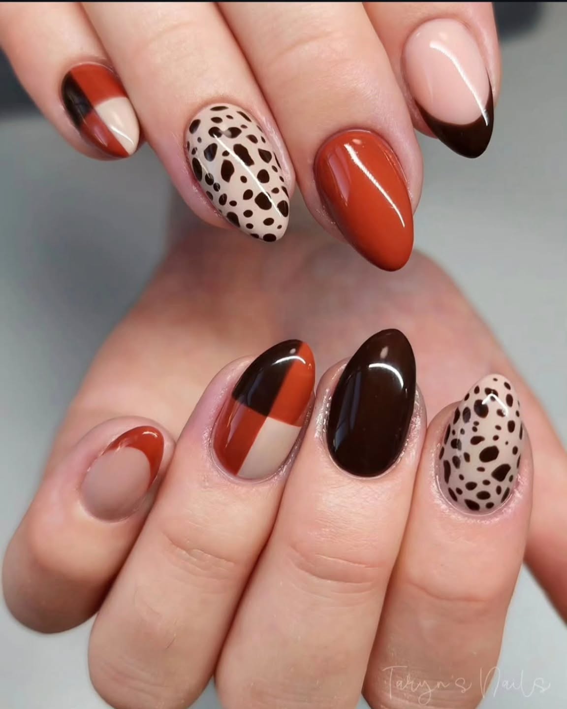 dark fall nails 2026 Burnt Cinnamon Meets Modern Animal Print