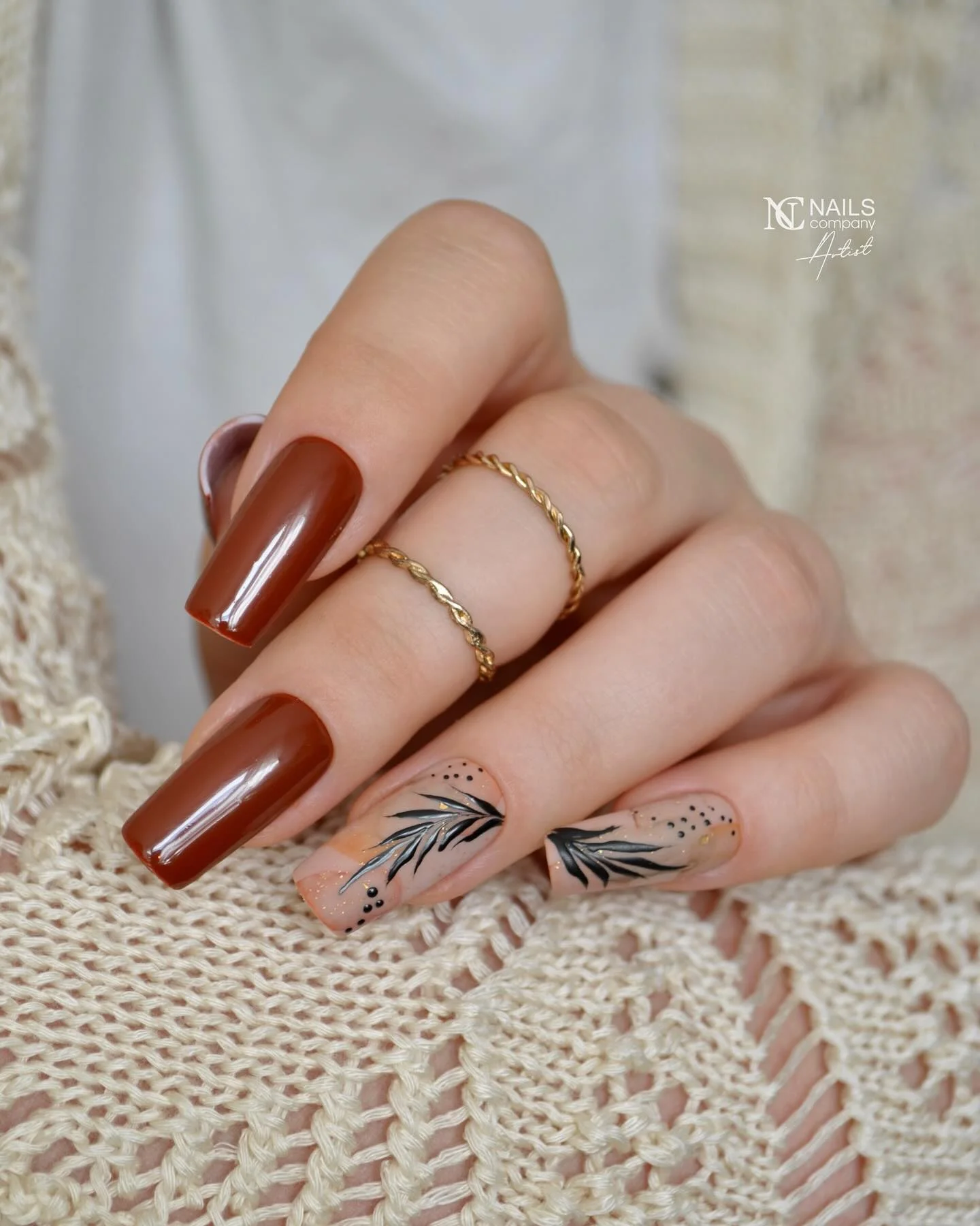 fall nails for fair skin tones 2026 Glossy Chocolate Brown With Delicate Leaf Art