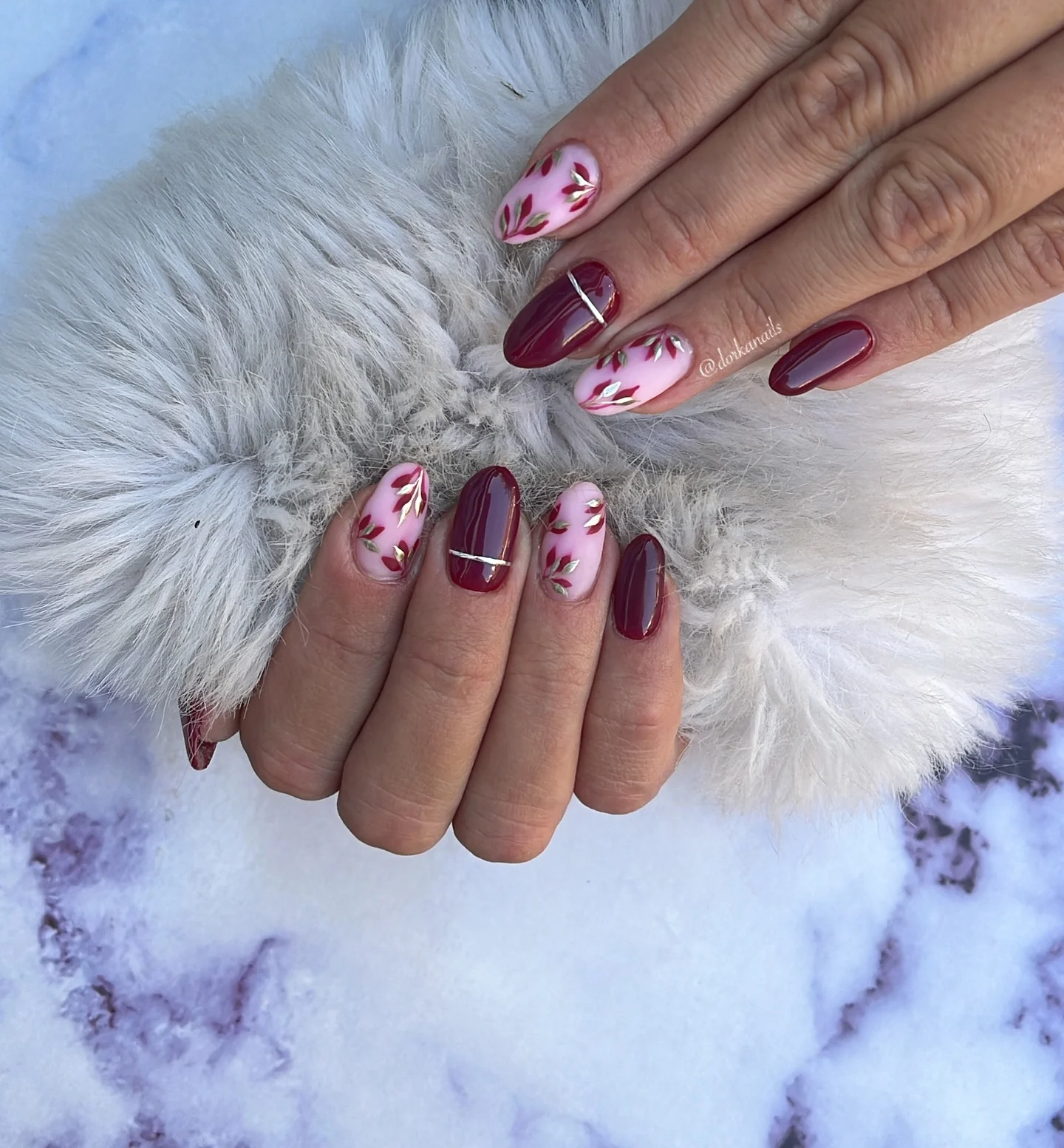 maroon fall nails 2026 Burgundy Almond Nails With Delicate Botanical Leaves