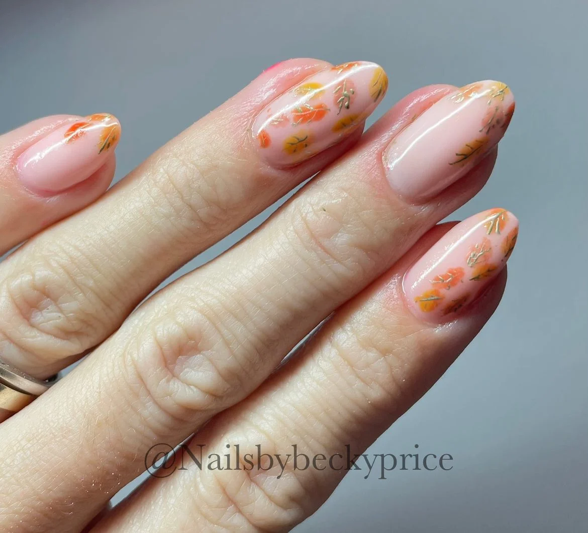 fall short almond nails 2026 Delicate Autumn Leaf Nails With Watercolor Charm