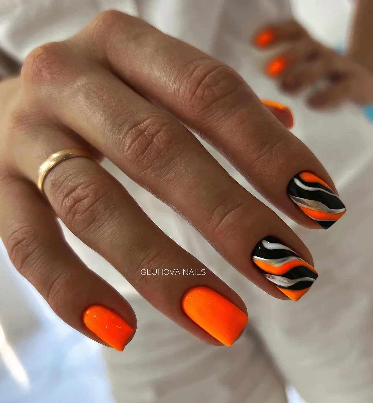 fall square nails 2026 Bright Orange With Black White And Silver Waves