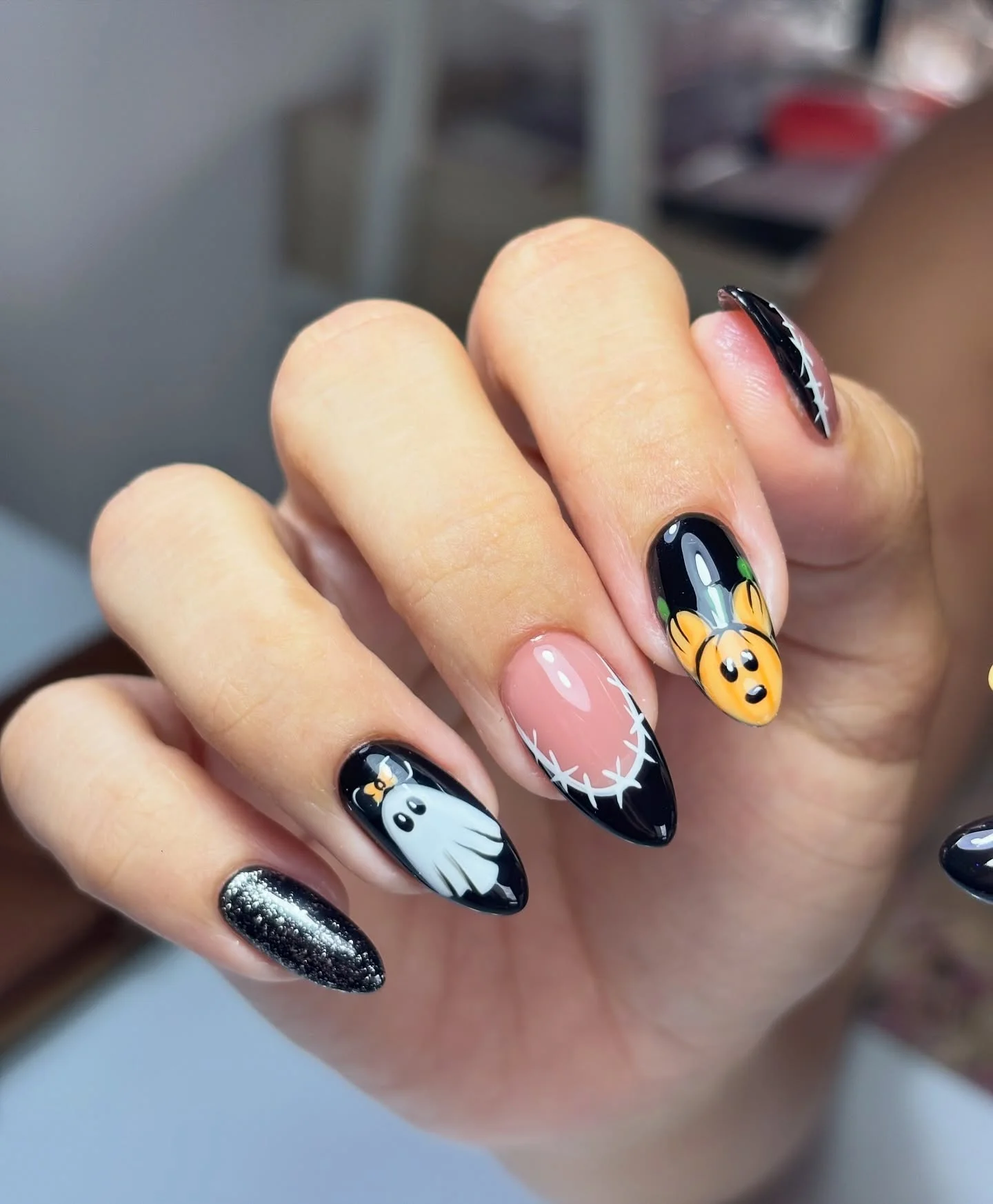 halloween nail art 2026 Playful Ghost And Pumpkin Halloween Almond Nails