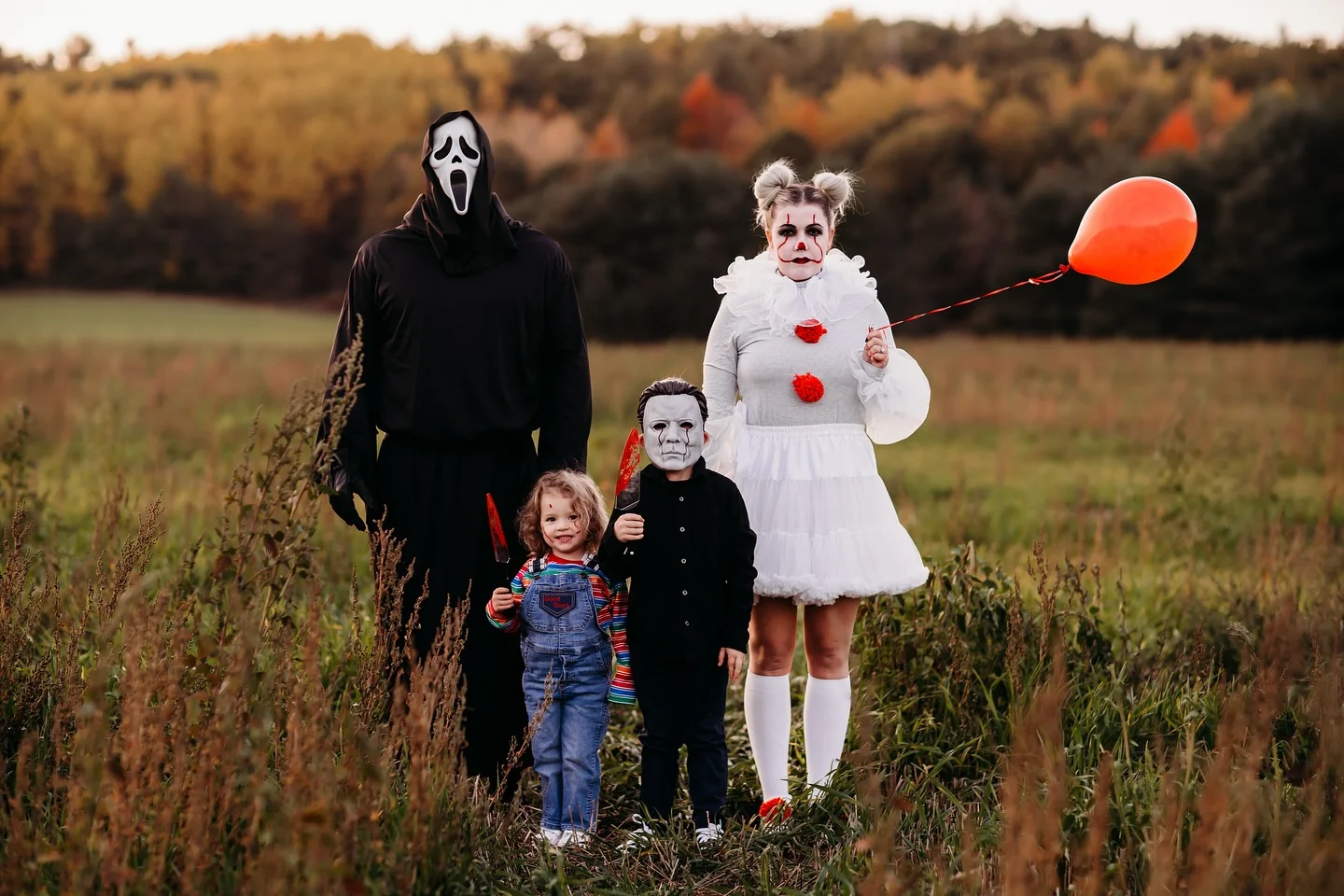 trendy halloween outfits 2026 Spooky Family Costumes In An Autumn Field