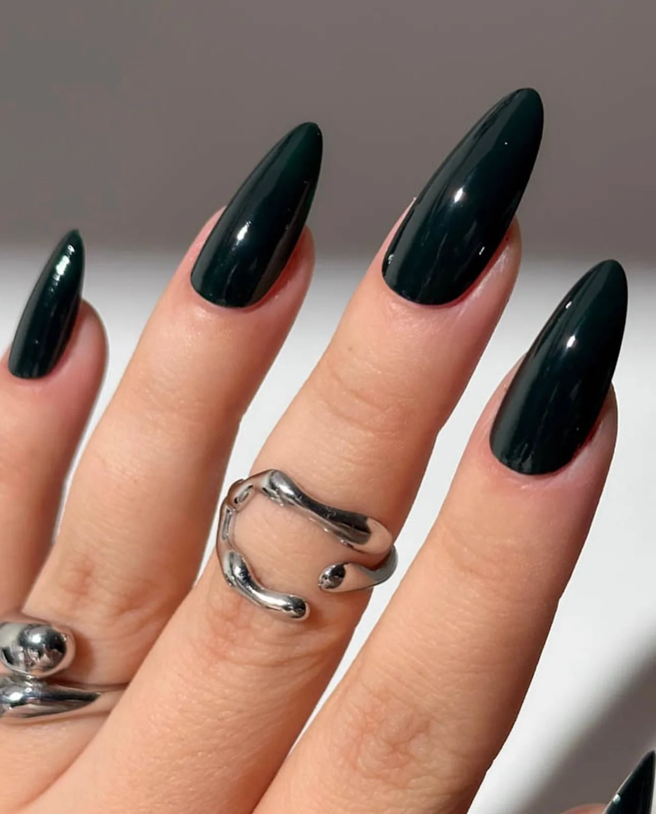 fall manicure colors 2026 Midnight Green With Sleek Almond Elegance