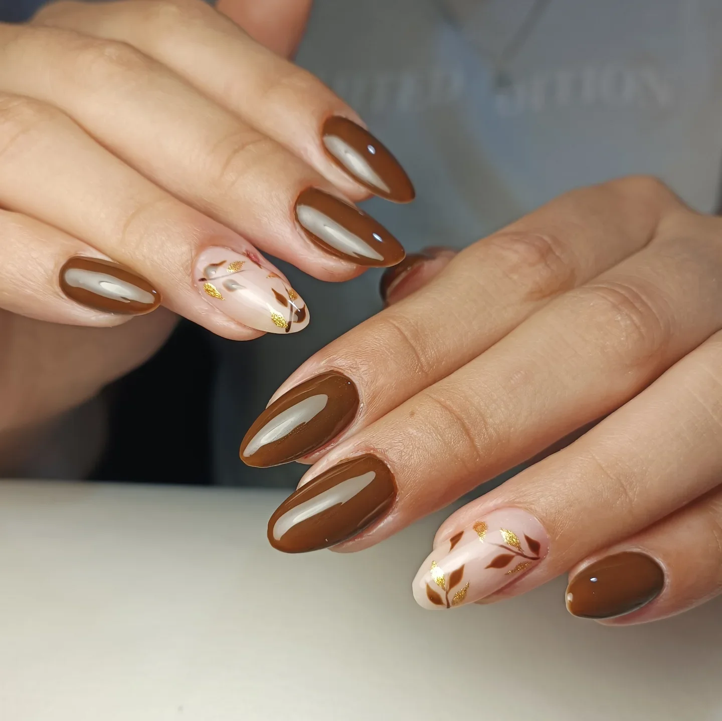 fall mid length nails 2026 Caramel Almond Nails With Delicate Golden Botanicals