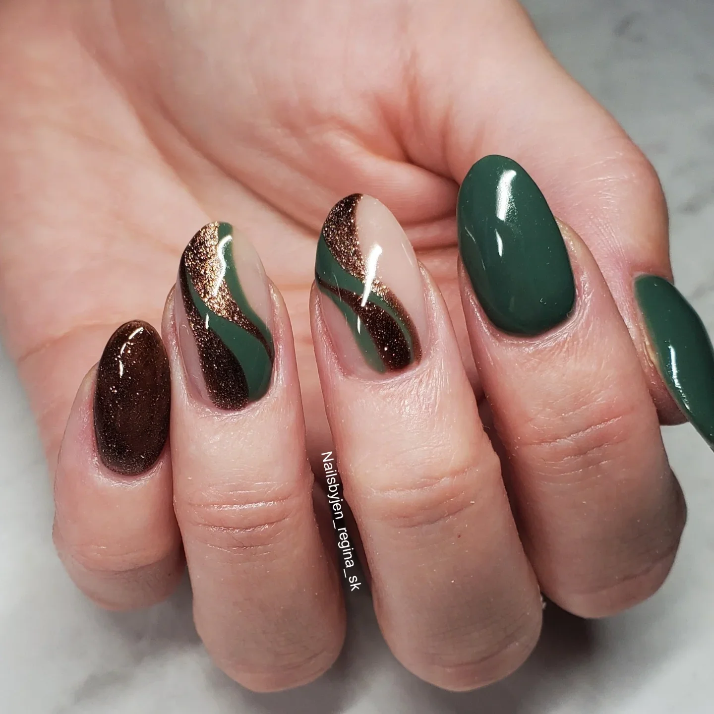 fall nails for fair skin tones Deep Forest Green With Sculptural Bronze Waves