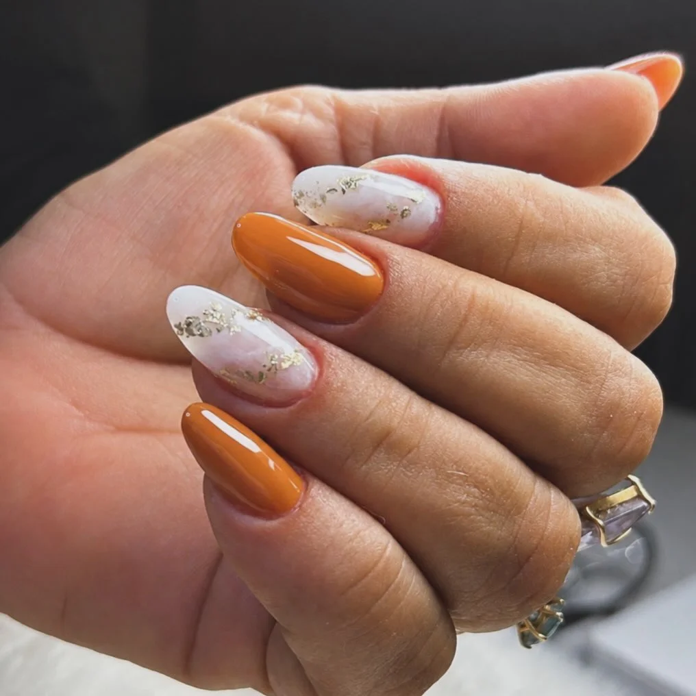 fall nails for tan skin tone Burnt Orange And Gold Foil Short Almond Nails