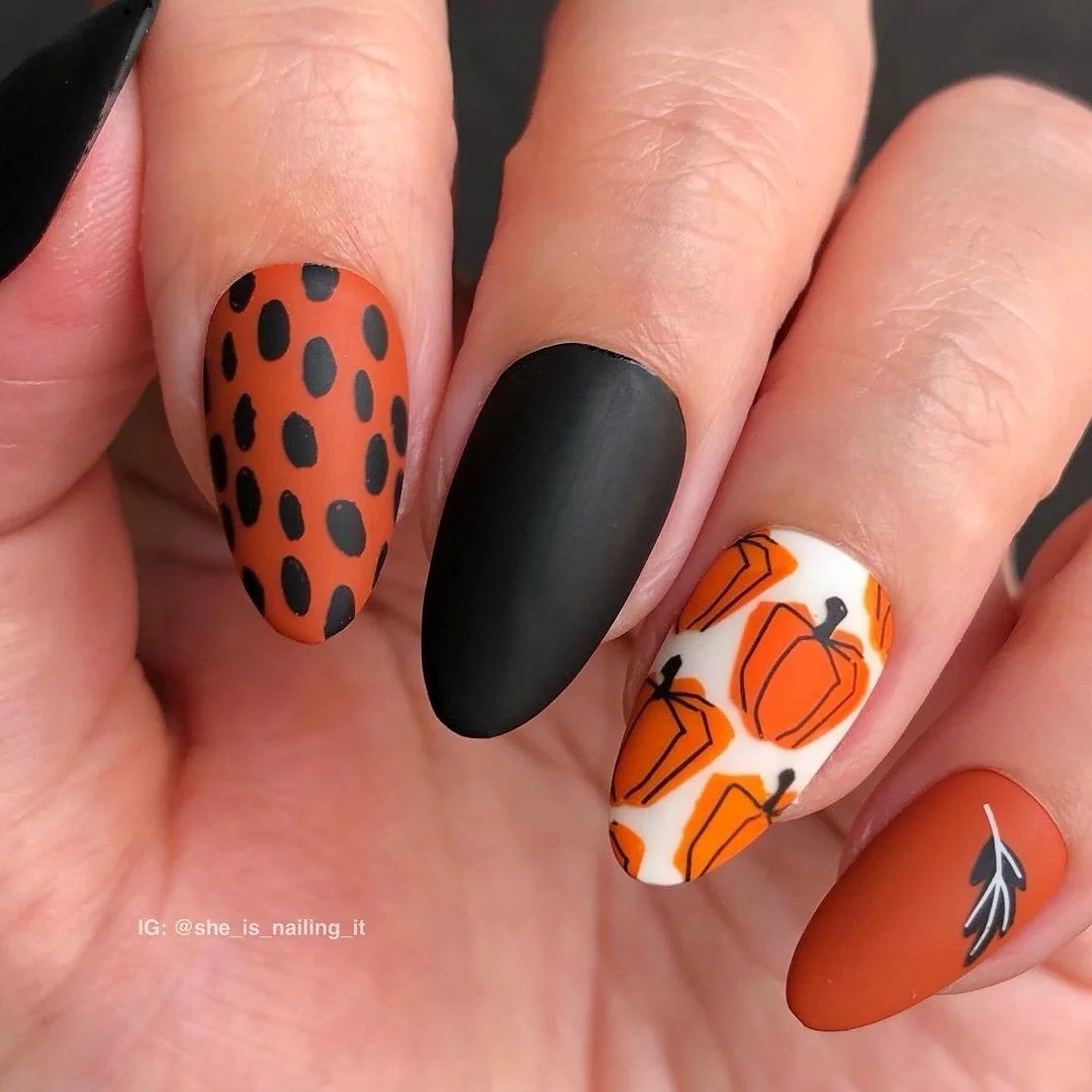 fall nail art ideas 2026 Matte Pumpkin And Black Halloween Nails