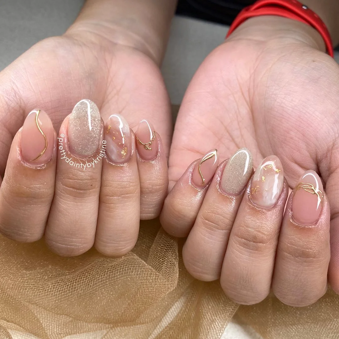 fall short almond nails 2026 Soft Champagne Glam With Delicate Gold Details