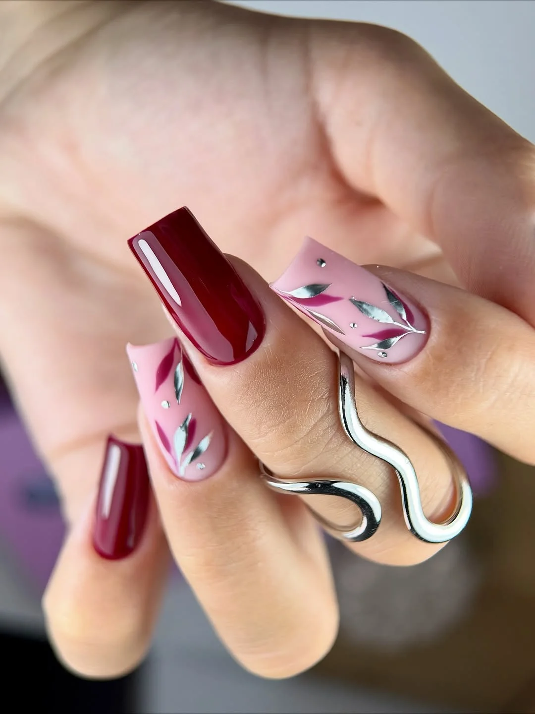 maroon fall nails 2026 Long Burgundy Square Nails With Silver Botanical Accents