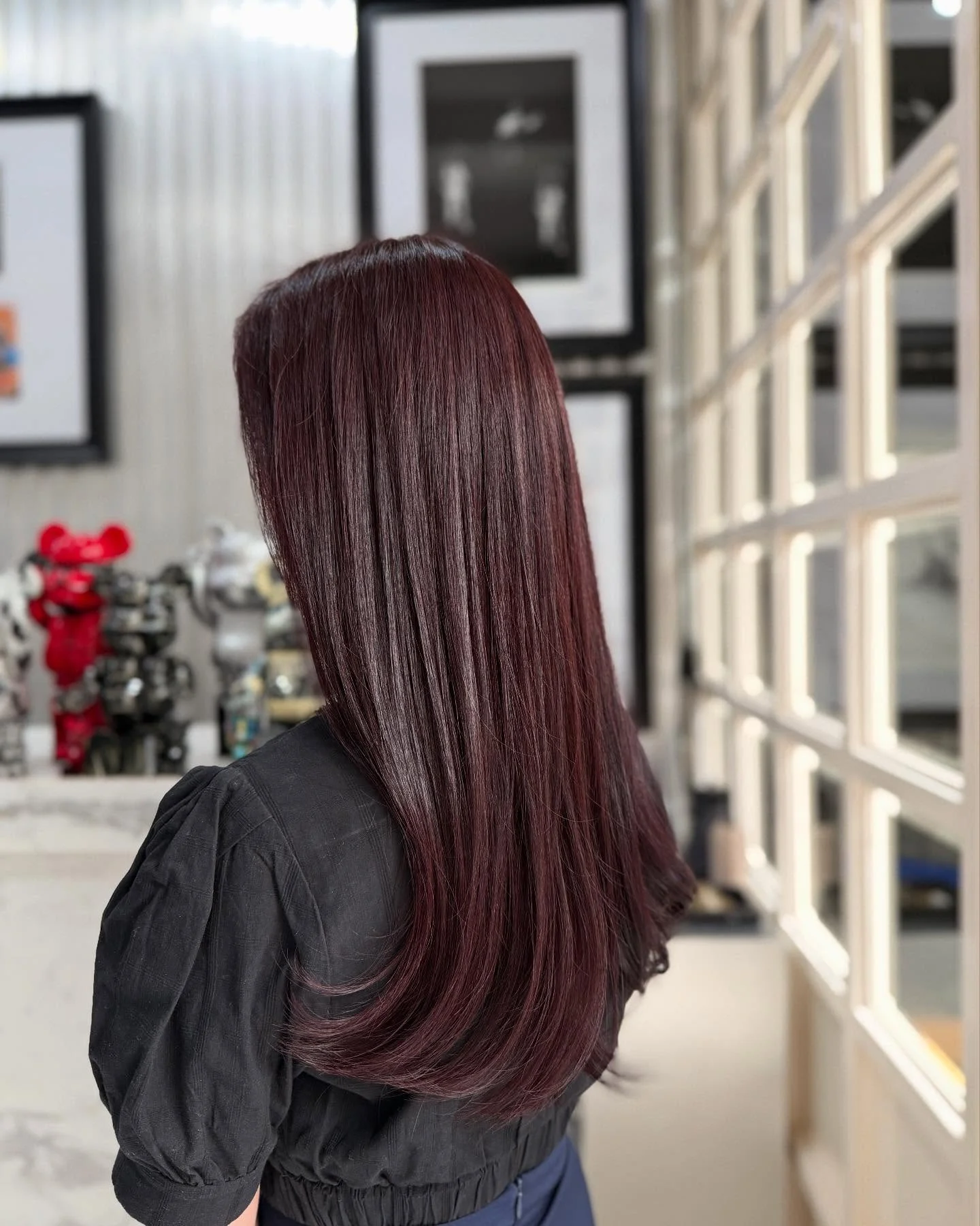 september hair color trends 2026 Glossy Cherry Cola Burgundy