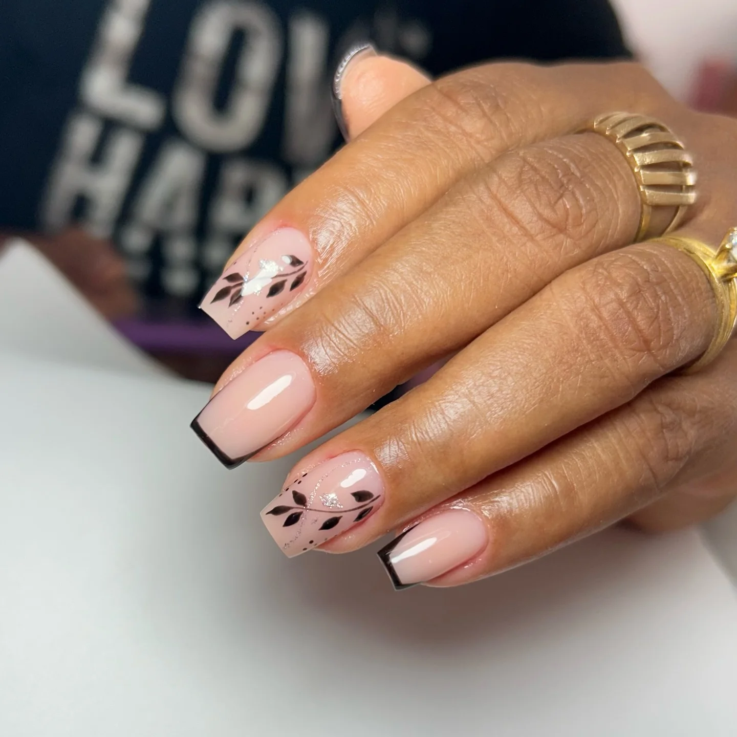 fall nail designs for office 2026 Minimal Black French With Botanical Nail Art