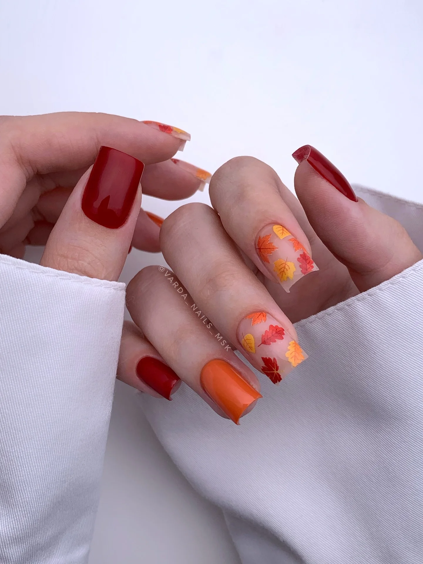 fall nails for fair skin tones 2026 Autumn Leaves In Red And Burnt Orange
