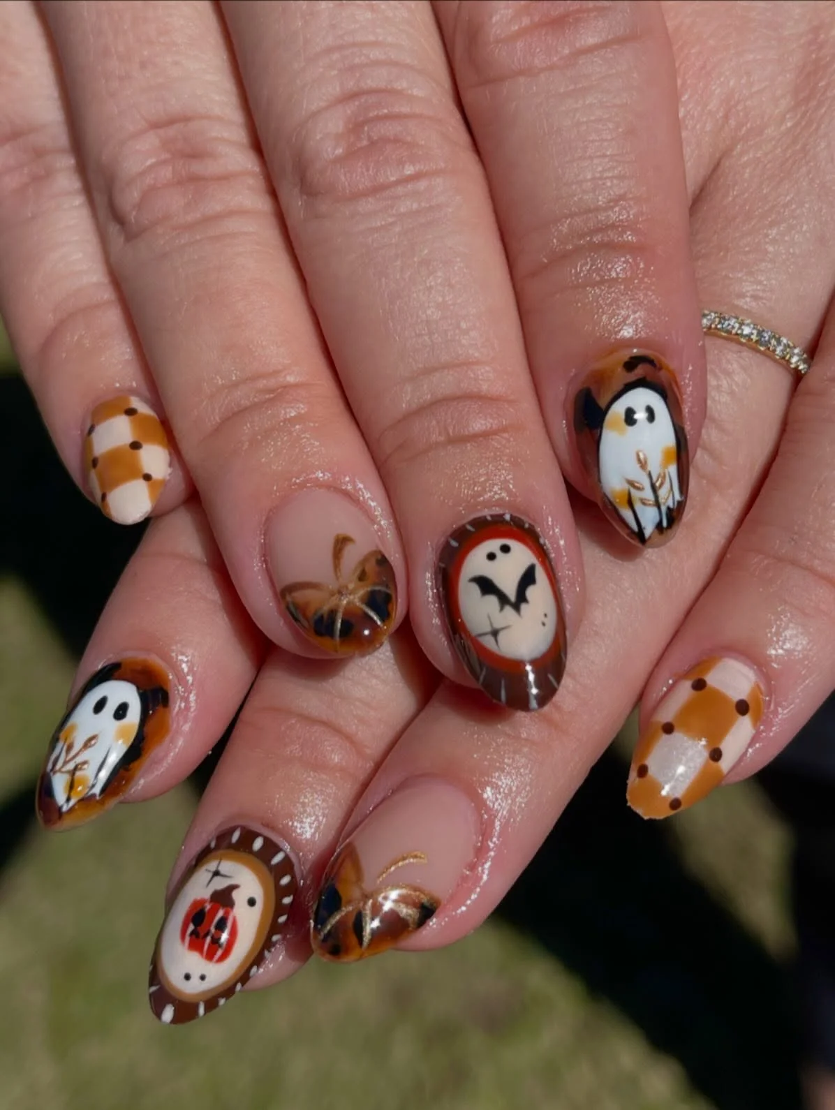 halloween nail art 2026 Cozy Pumpkin And Ghost Nails For A Soft Halloween Look