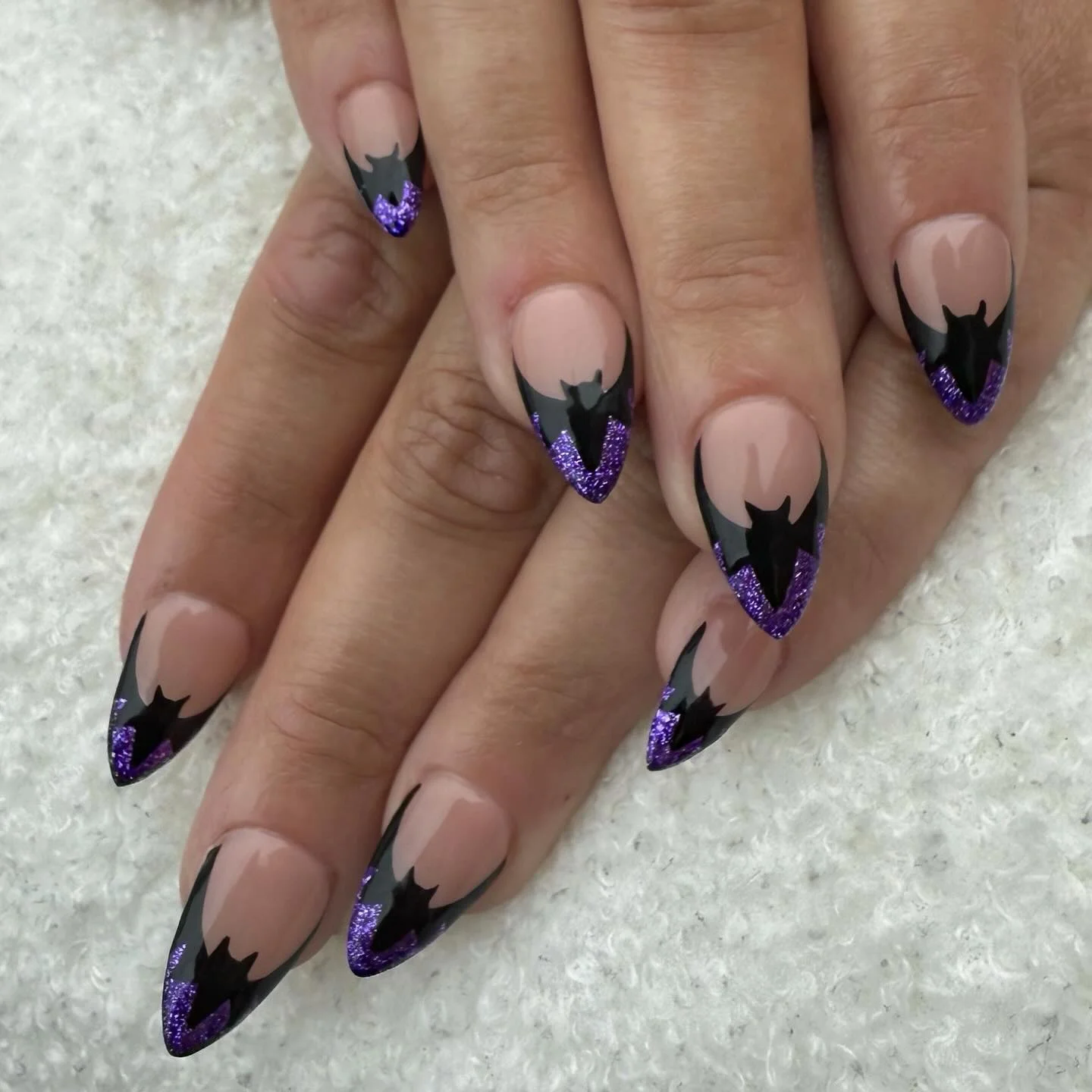 halloween nails designs 2026 Black And Purple Bat French Tips For A Glamorous Halloween