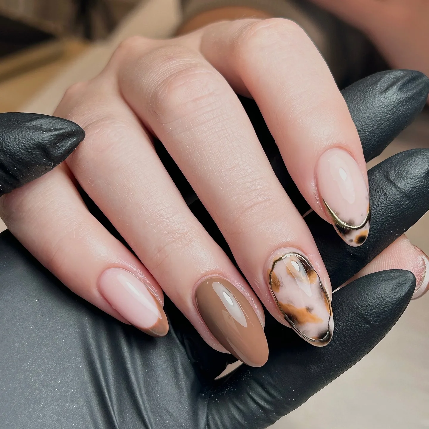 fall nails for pale skin 2026 Soft Nude And Tortoiseshell Almond Elegance