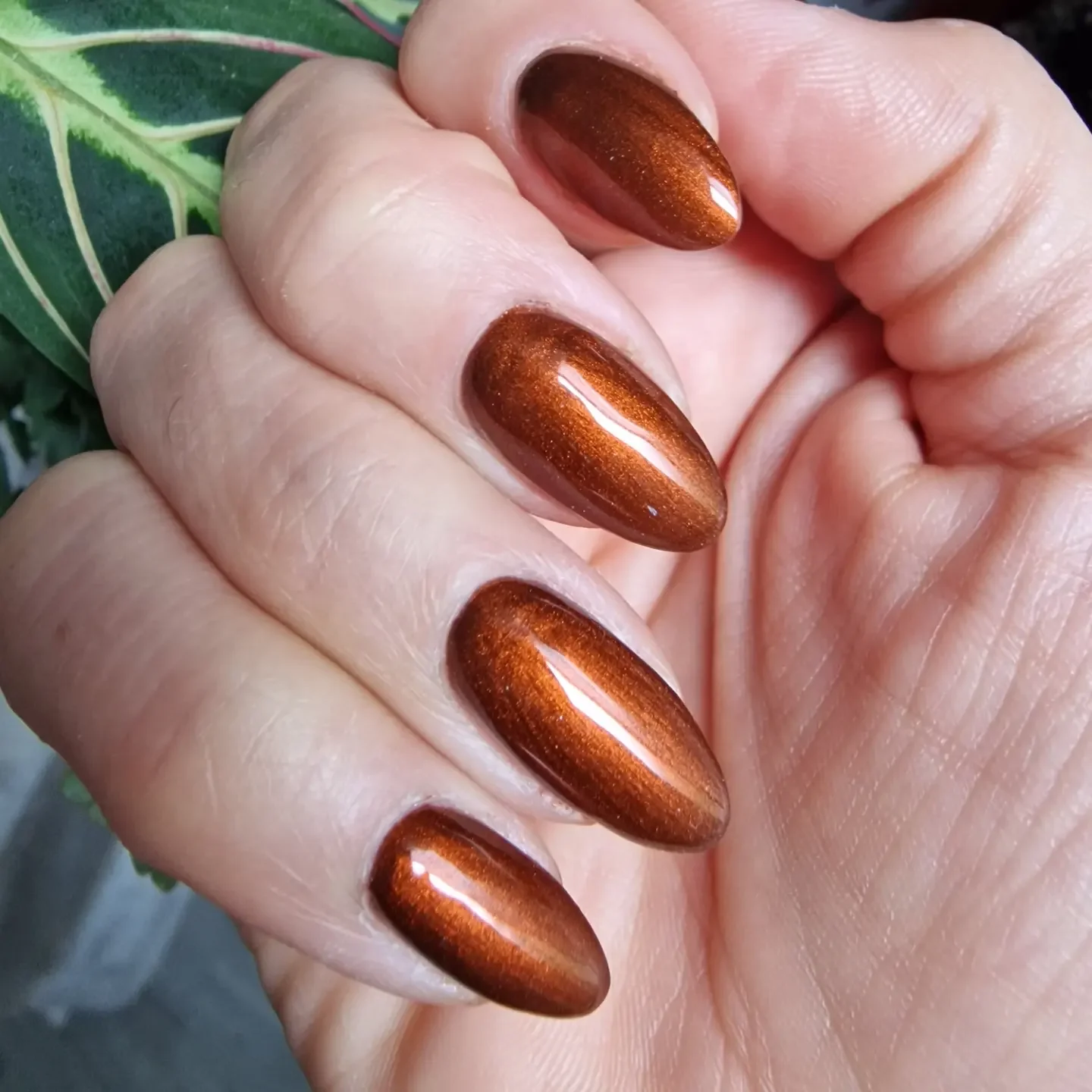 autumn nails color Burnished Copper Almond Nails With A Metallic Glow