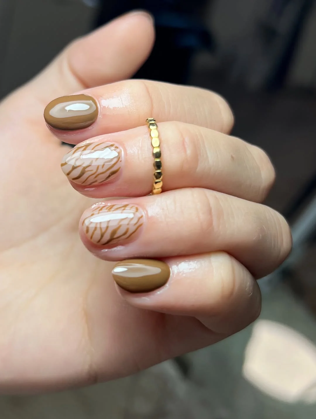 brown fall nails 2026 Soft Latte Nails With Modern Zebra Details