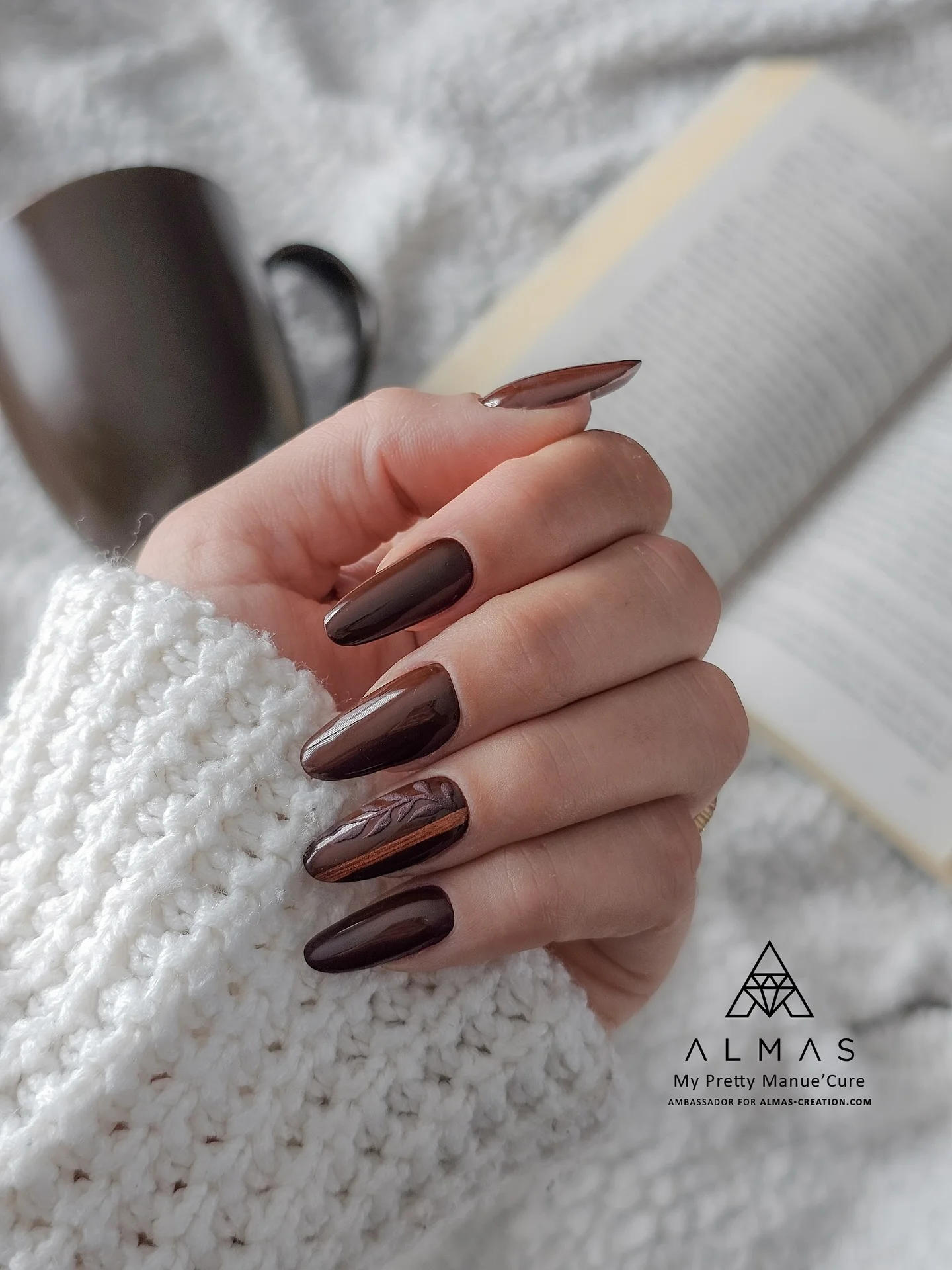 fall nails for fair skin tones 2026 Glossy Espresso Almond Nails With A Textured Accent