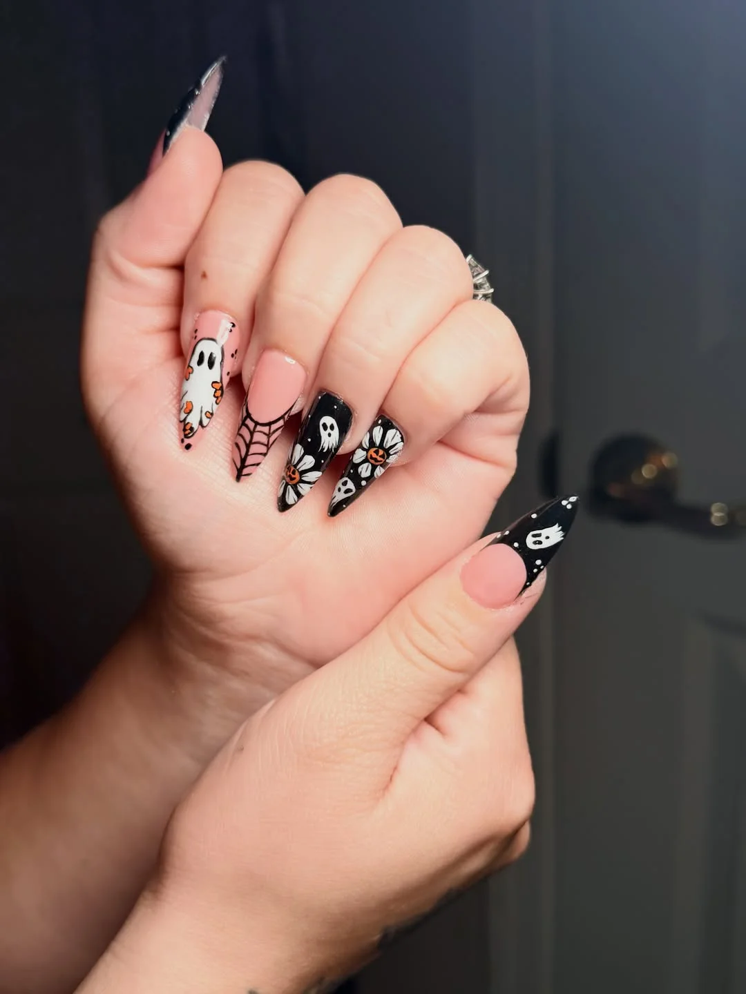 halloween nail art 2026 Ghosts And Spiderwebs On Soft Pink