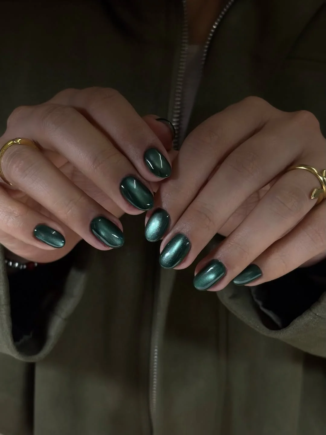 fall manicure colors 2026 Deep Emerald Chrome For A Moody Autumn Statement