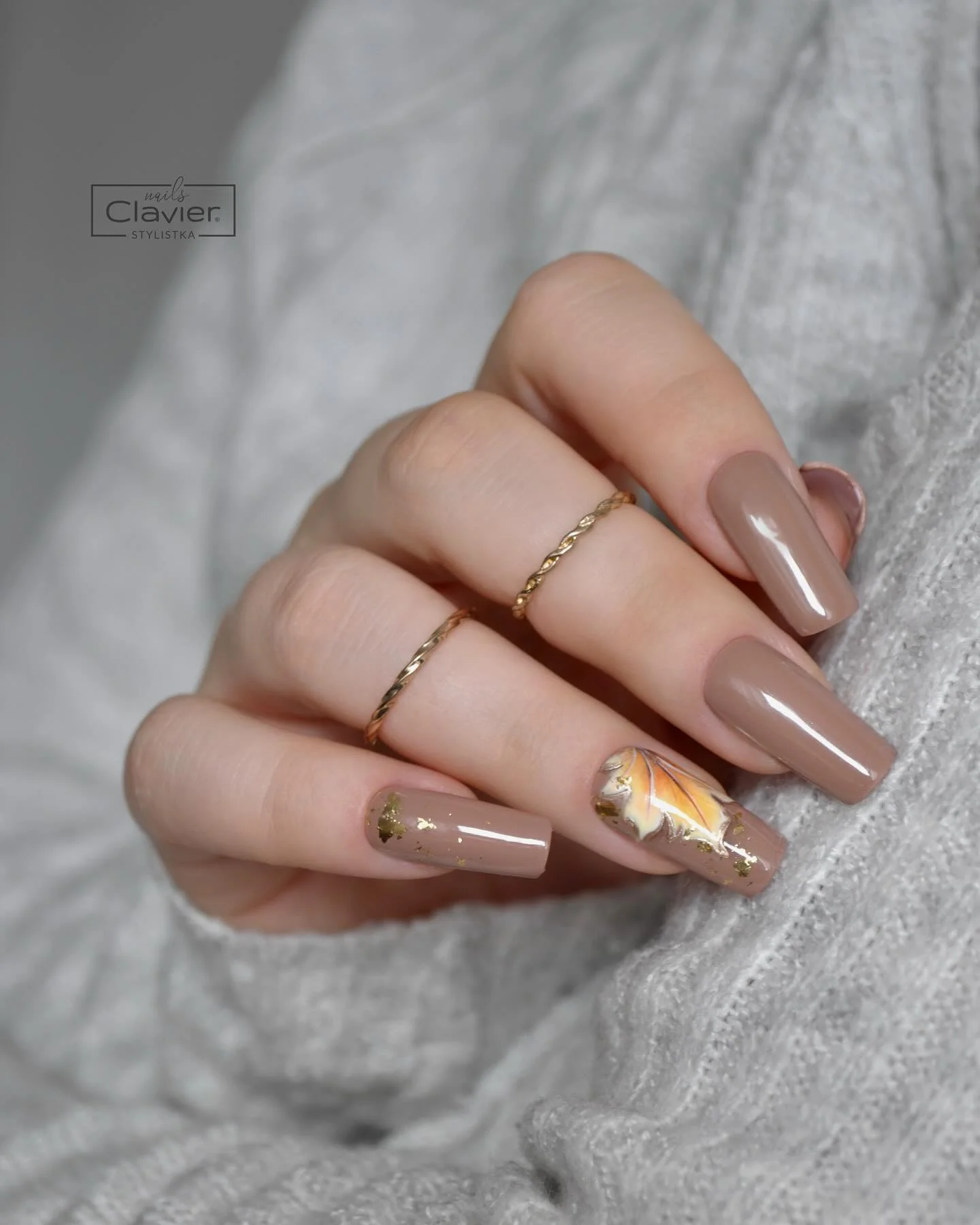 fall nails for fair skin tones 2026 Warm Taupe And Gold With An Abstract Autumn Accent