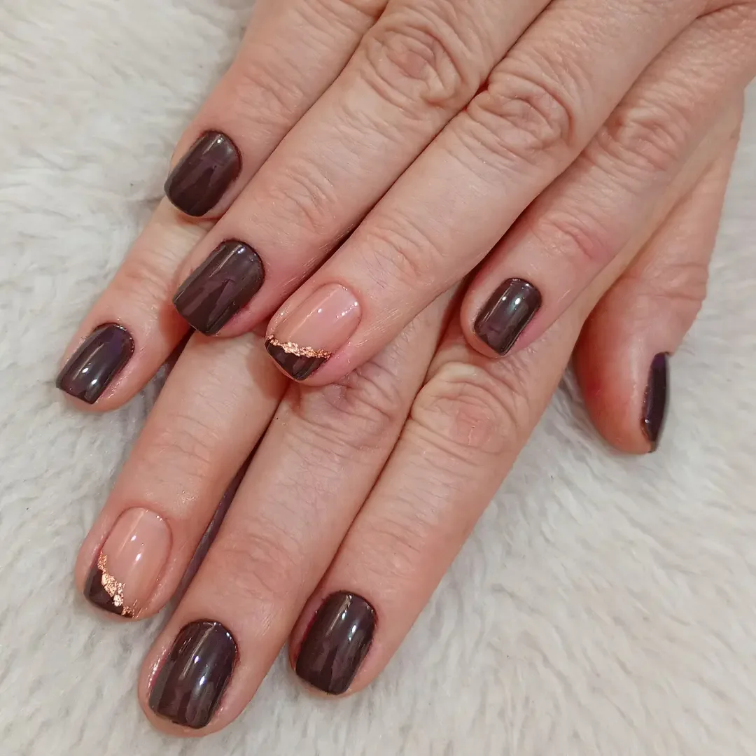 fall nails with accent nail Deep Chocolate Nails With Nude And Gold Glitter Details