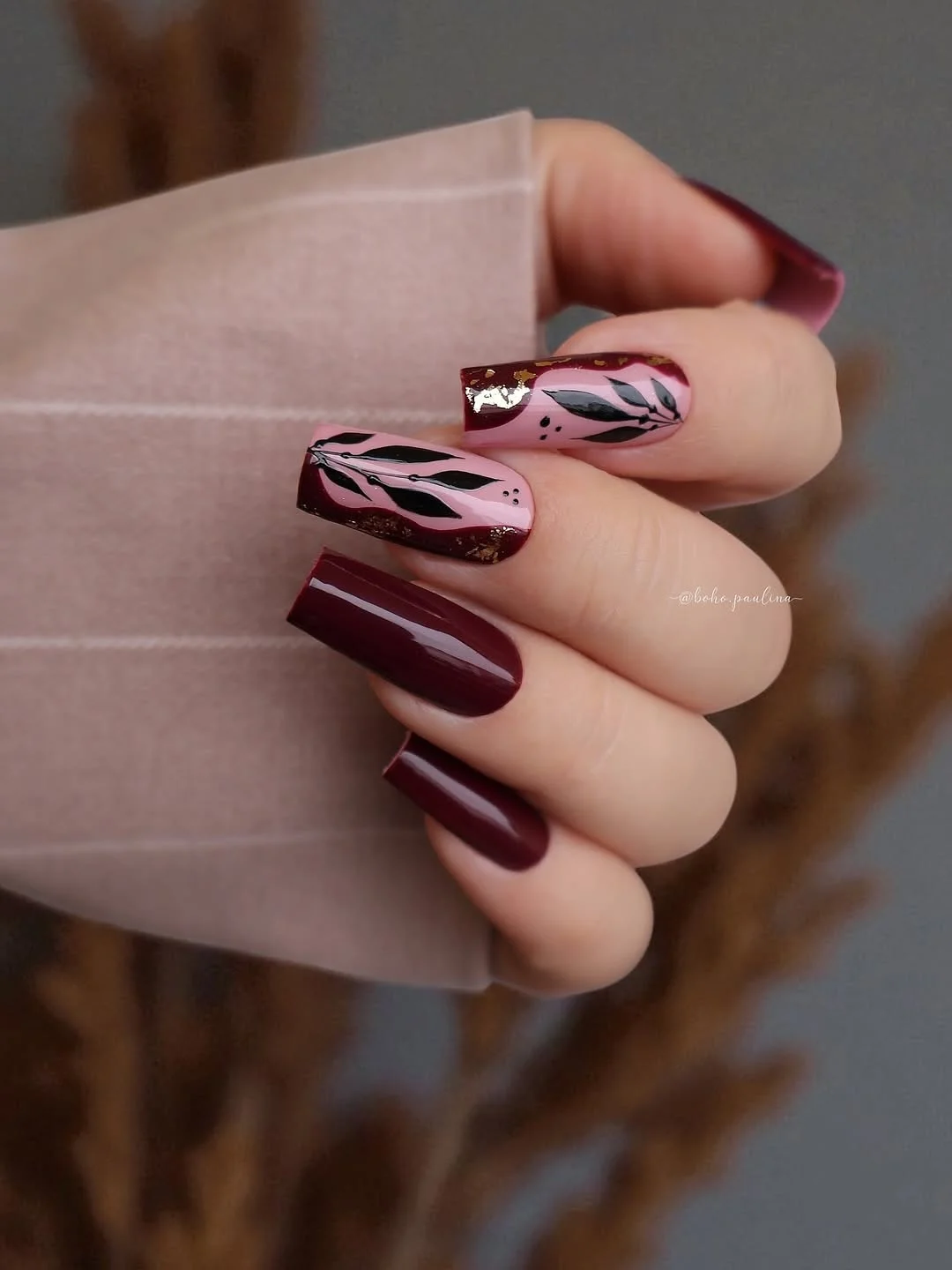 dark fall nails 2026 Burgundy Botanical Nails With Luxurious Gold Details
