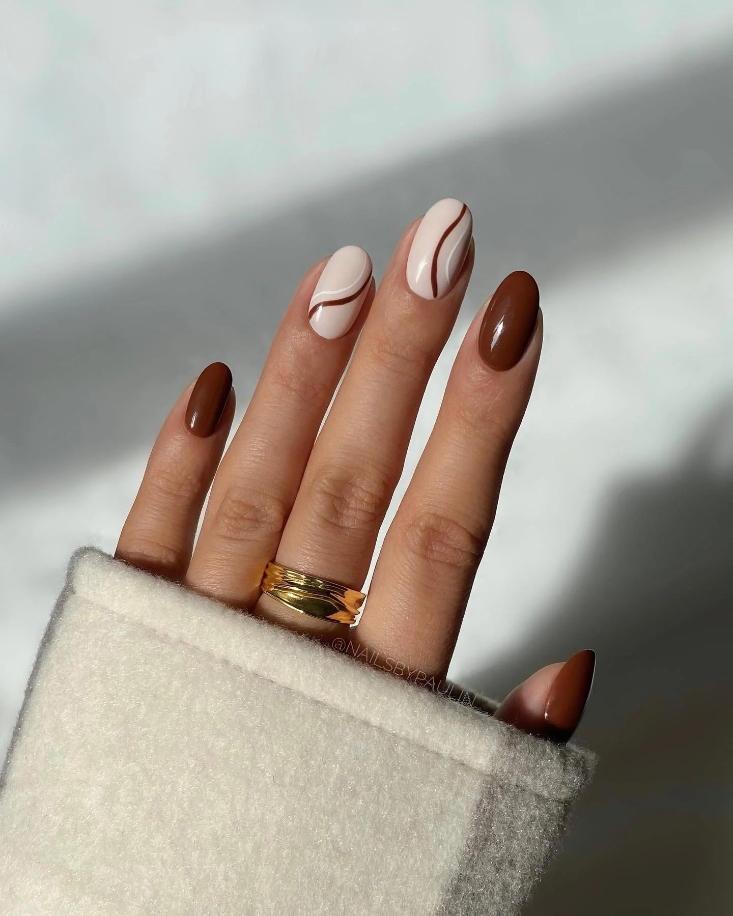fall gel nails ideas 2026 Minimal Mocha Waves On Creamy White Nails