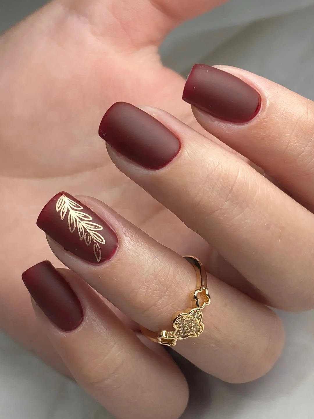 fall nail designs square shape 2026 Matte Burgundy Nails With Delicate Botanical Art