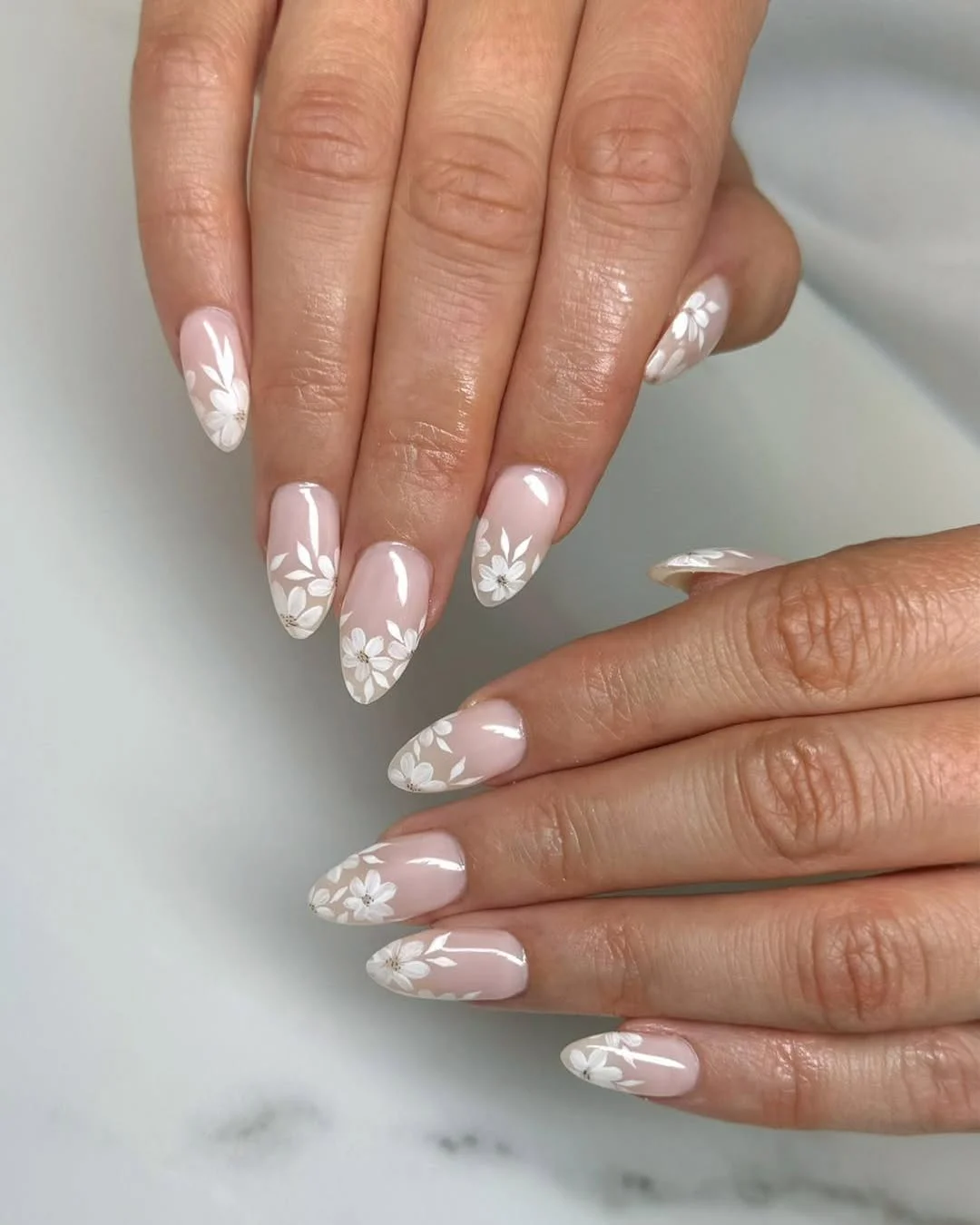 fall wedding nails 2026 Delicate White Floral Nails For A Romantic Ceremony